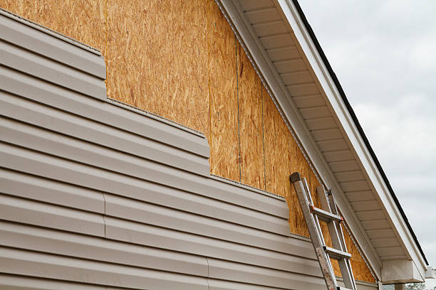 Professional Siding technician working in Machipongo, VA